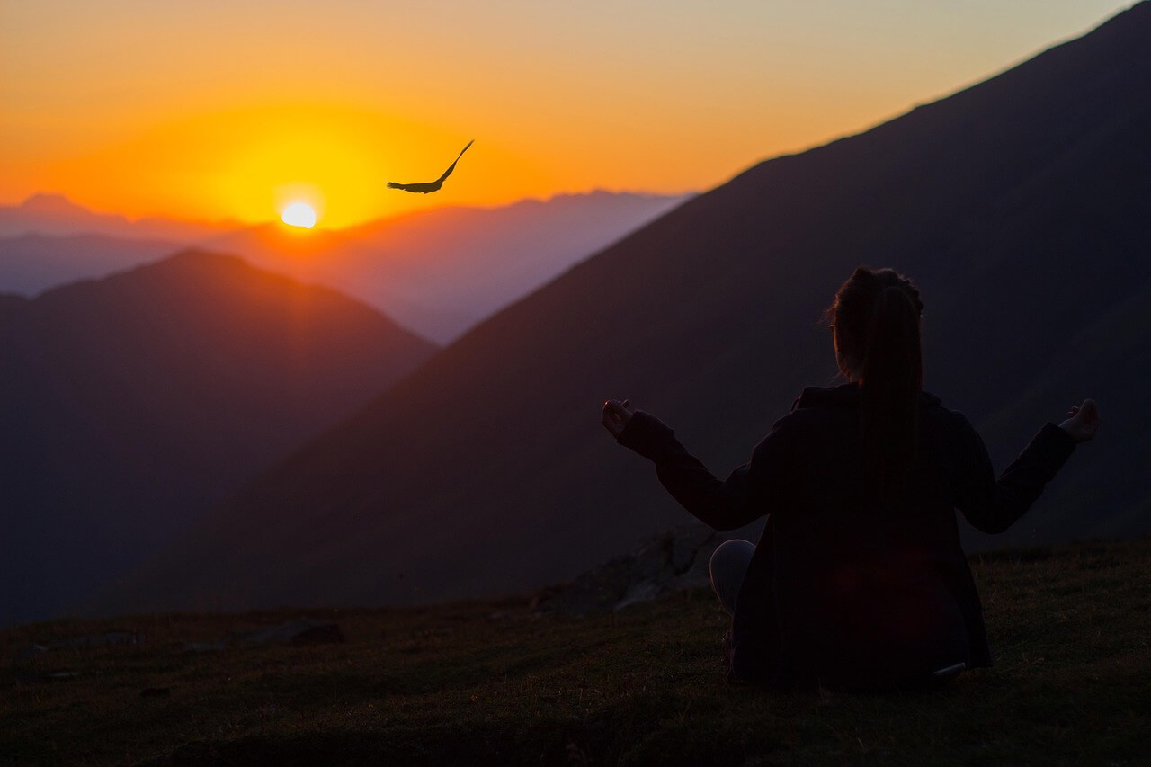 Confident midlife woman reflecting on personal growth and reframing failure with a positive mindset.